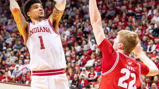 Indiana's Kel'el Ware (1) scores past Wisconsin's Steven Crowl (22) during the first half of the Indiana versus Wisconsin men's basketball game at Simon Skjodt Assembly Hall.